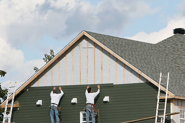 Professional Emergency Siding Repair technician working in Quincy, OH